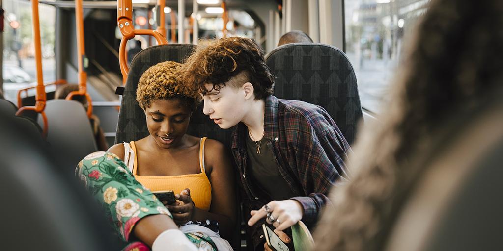 two teens on the bus